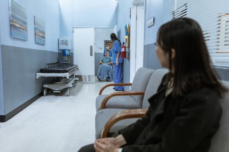A hospital scene showing patients and medical staff in a corridor, illustrating healthcare environments.