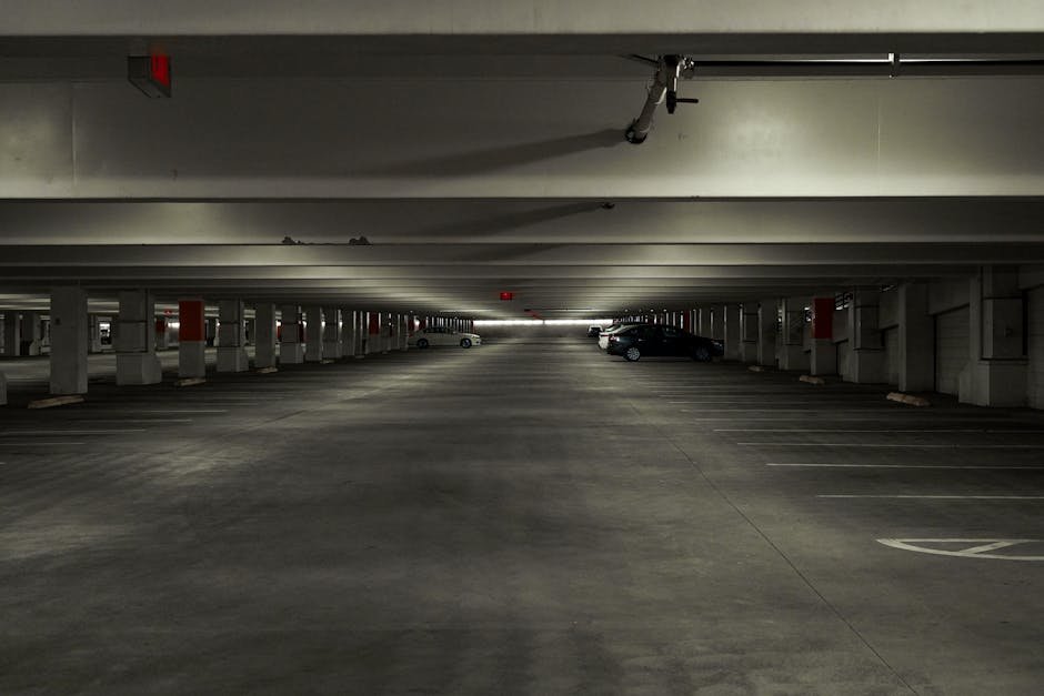 Explore the quiet, symmetrical interior of a multi-storey parking garage in Los Angeles.
